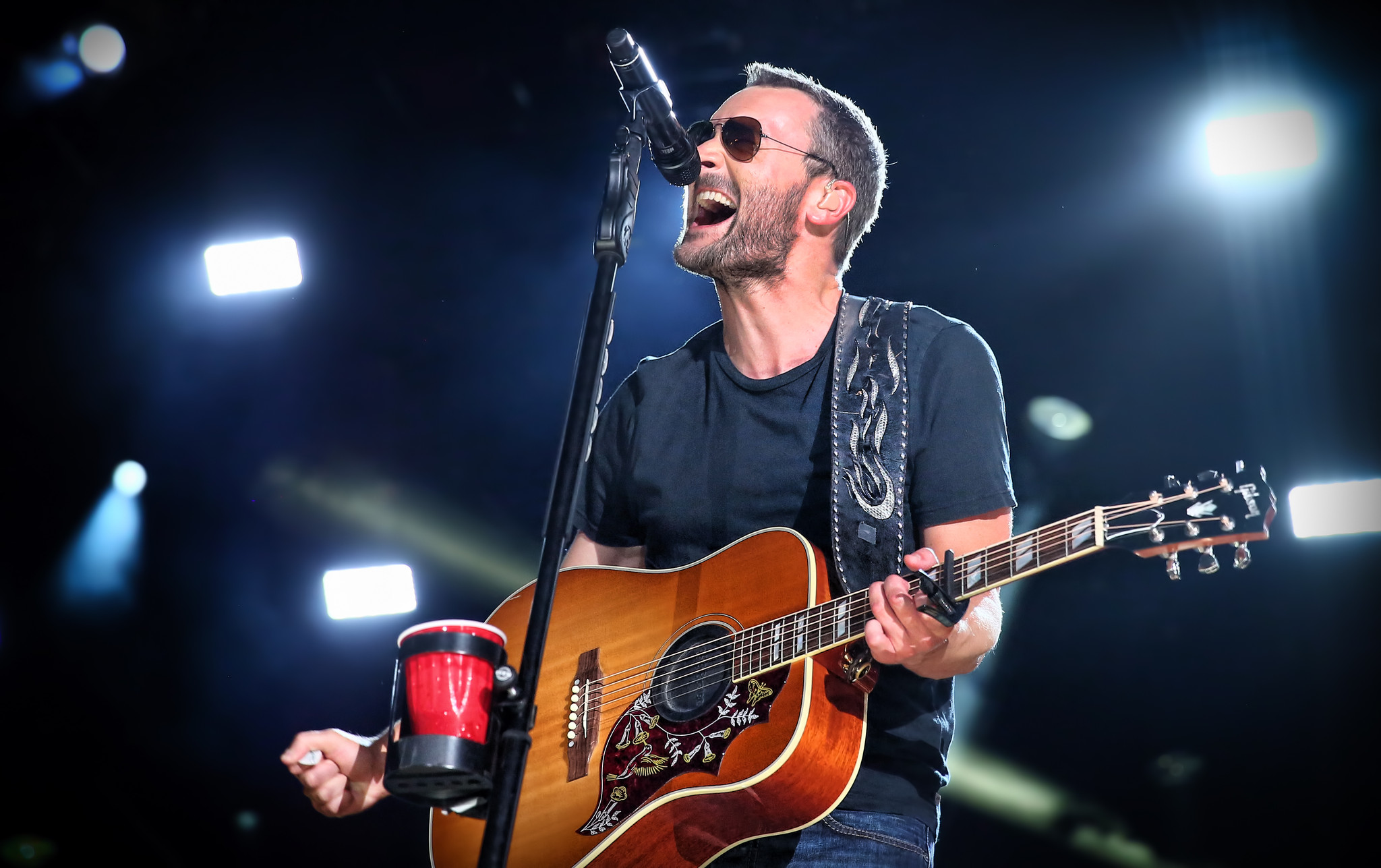 Musician Eric Church performs on stage.